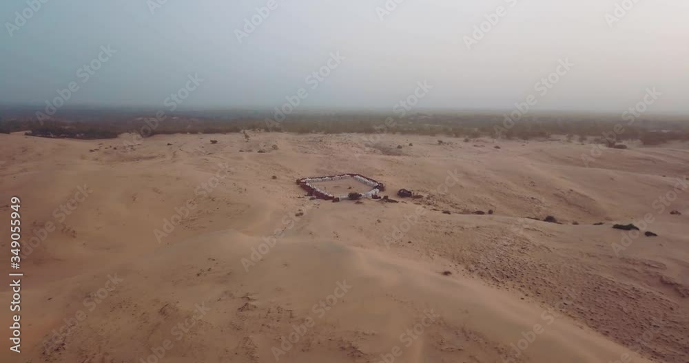 lompoul desert yellow sand photographed from the air in Africa camels and drivers go by caravan in Africa lompoul desert yellow sand photographed from the air in Africa camels and drivers go by caravan in Africa