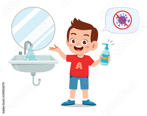 happy cute little kid boy wash hand in sink