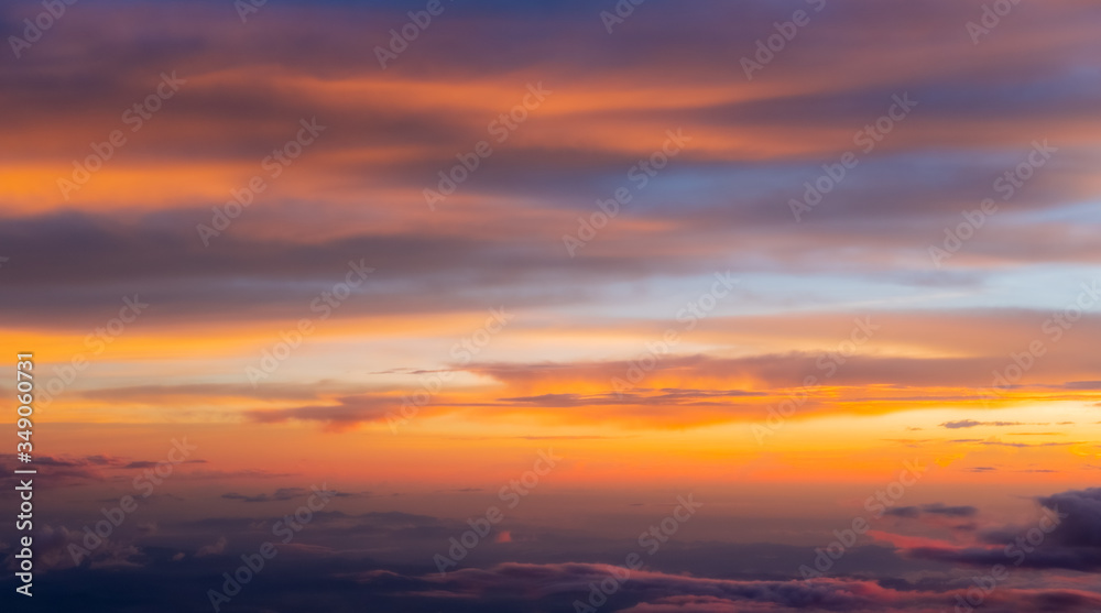 Sunset sky background vivid color sky background. view from plane.