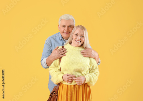 Happy senior couple embraci...