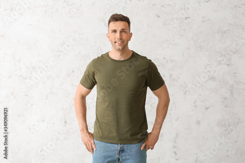 Man in stylish t-shirt on l...