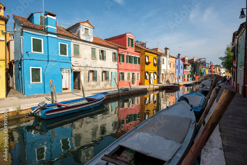 Panoramic view of Burano channel and colorful houses, in Venice, Italy. © christian vinces