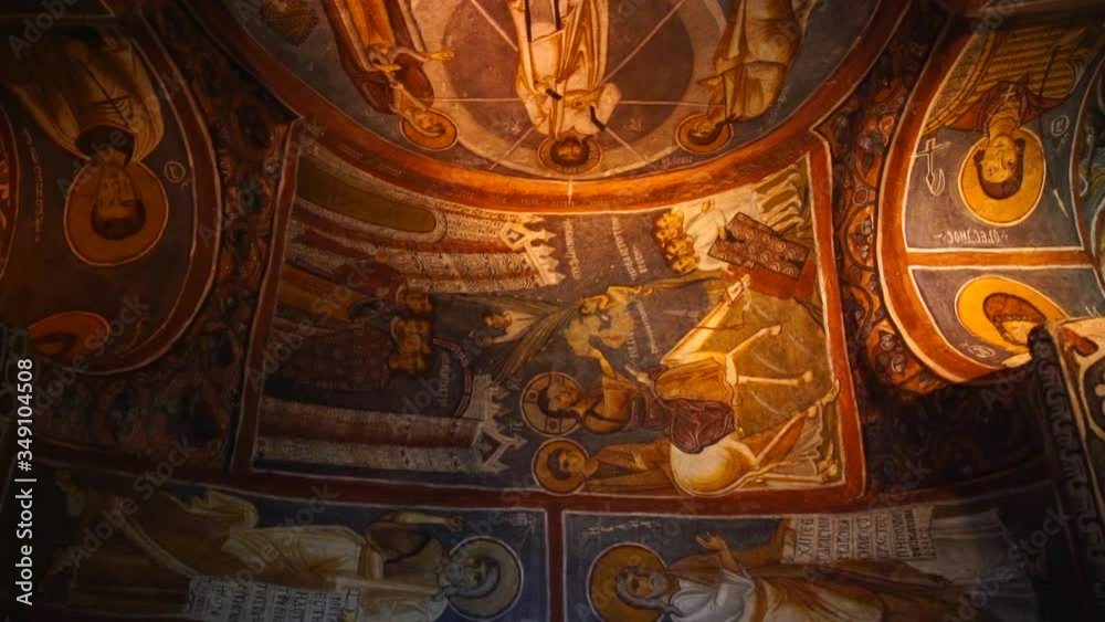 Religious Painting and Decoration on Ceiling of Goreme Cave Church. Tilt Down