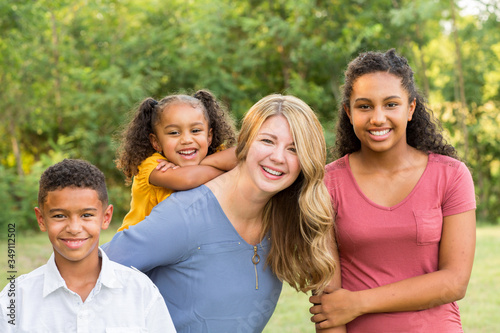 Portrait of a happy mixed race family smiling