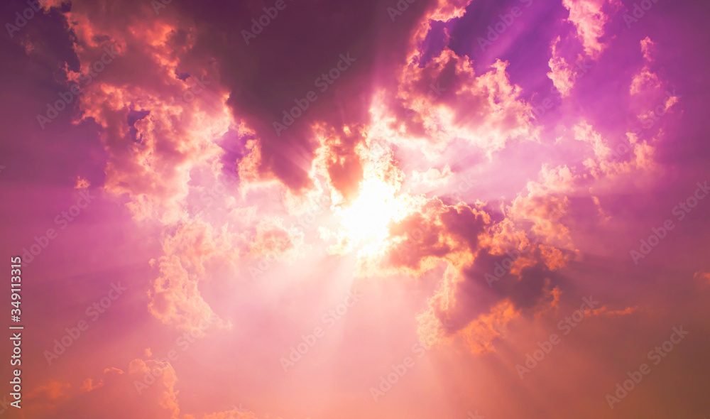 bright sun and sun beam light in purple pink sky with fluffy clouds,fantasy sky bright sun and sun beam light in purple pink sky with fluffy clouds,fantasy sky