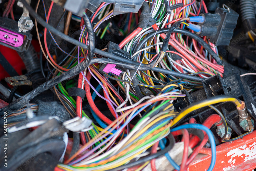 Electronic waste of outdoor cables, dirty and wasted, discarded raw materials, environmental pollution. Electronic waste of outdoor cables, dirty and wasted, discarded raw materials, environmental pollution.