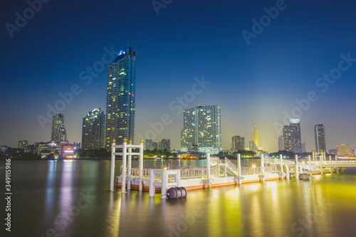 Harbor at night with city views
