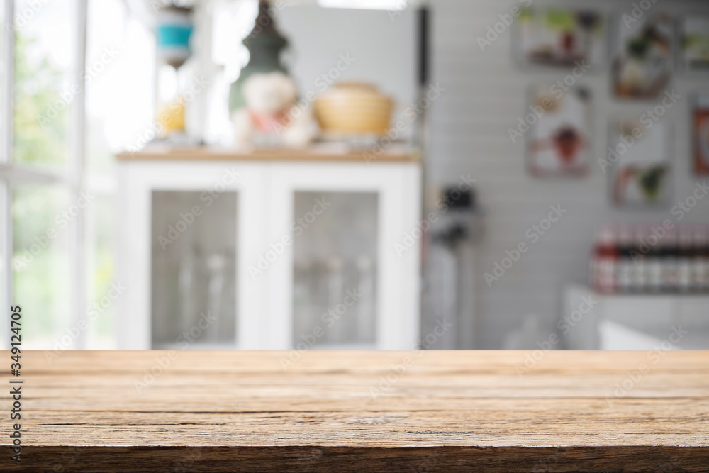 Wood desk space and blurred of kitchen background. for product display montage. business presentation. Wood desk space and blurred of kitchen background. for product display montage. business presentation.
