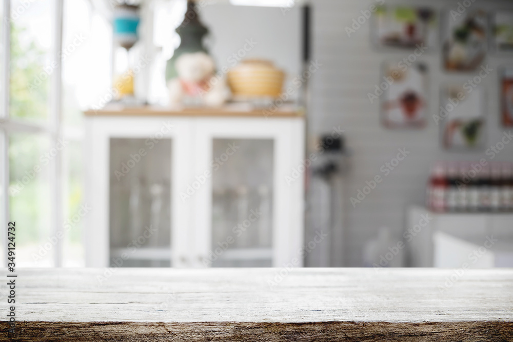 Wood desk space and blurred of kitchen background. for product display montage. business presentation. Wood desk space and blurred of kitchen background. for product display montage. business presentation.