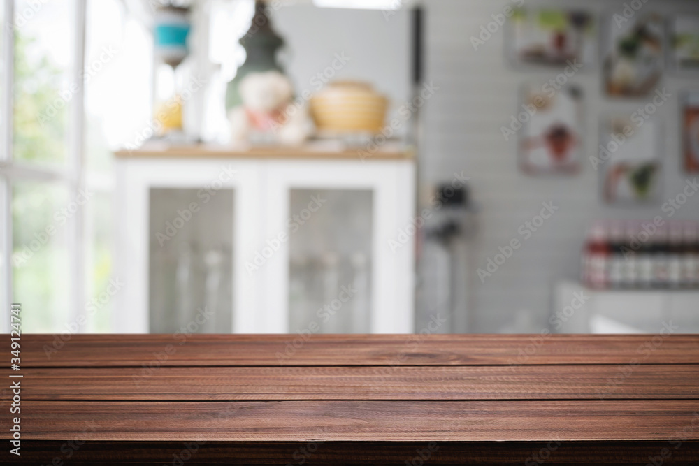 Wood desk space and blurred of kitchen background. for product display montage. business presentation. Wood desk space and blurred of kitchen background. for product display montage. business presentation.