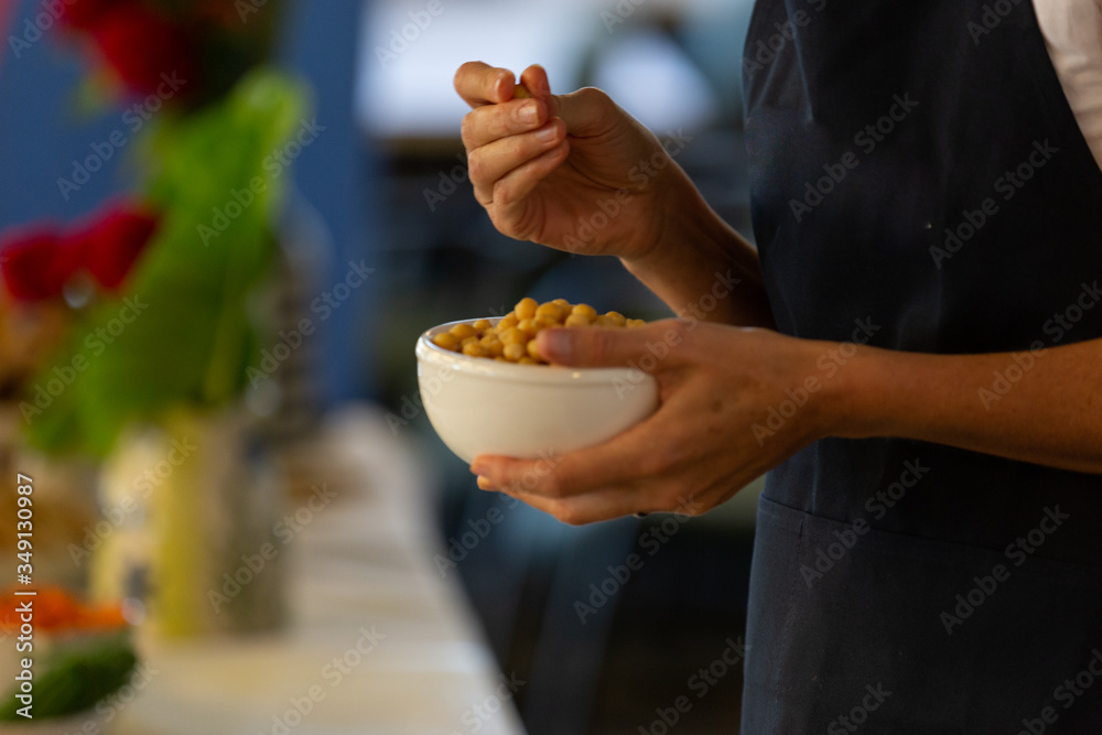 Woman Hands holding a bowl of fresh beans