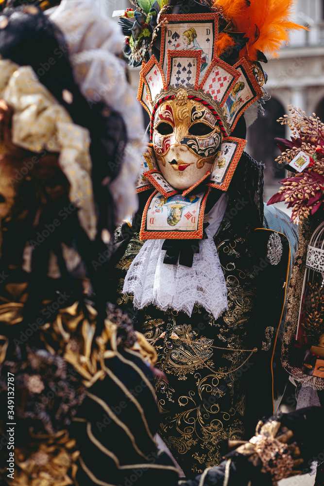 Fototapeta premium Portrait of a couple with beautiful masks in Venice, Italy