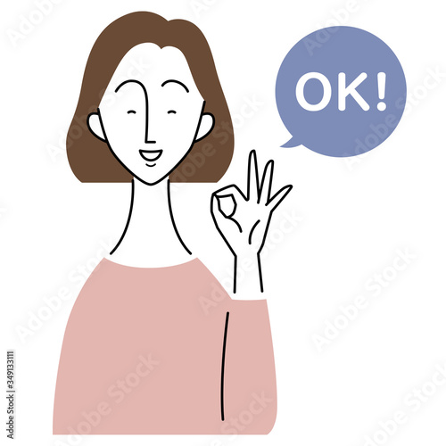 "OK"のジェスチャーをする女性