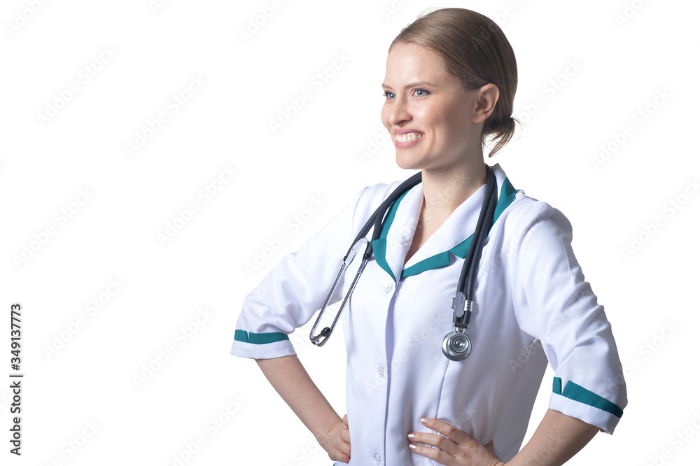 Portrait of female happy doctor posing on white Portrait of female happy doctor posing on white