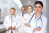 Group of doctors against the hospital background