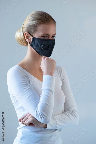 Portrait of young and natural woman in medcial mask. Pandemic, coronavirus, covid-19 and protection concept. photo