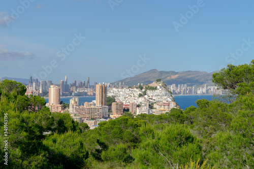 Panorama of Benidorm city skyscrapers, Mediterranean sea natural parks and mountains, Benidorm Spain