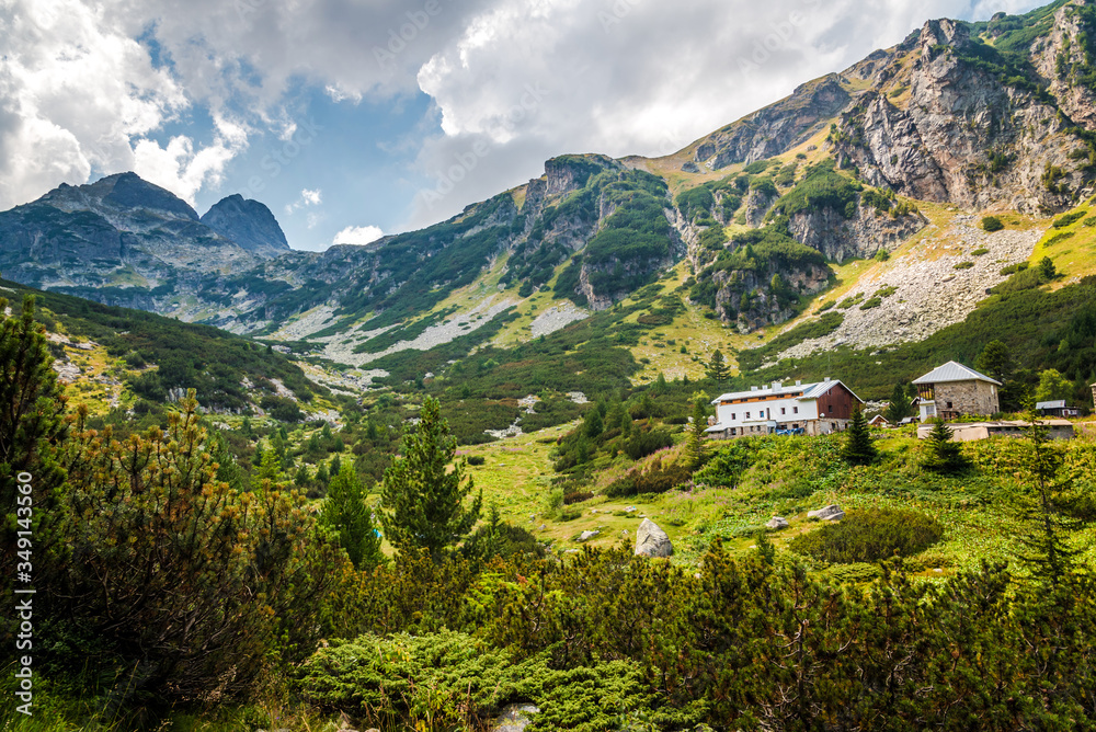 Fototapeta premium Beautiful summer mountain landscape in Rila mountain, Bulgaria. Mountain scenery and a mountain lodge.