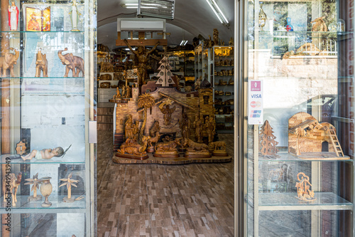Open doors of a gift shop with wood products in Bethlehem in Palestine photo