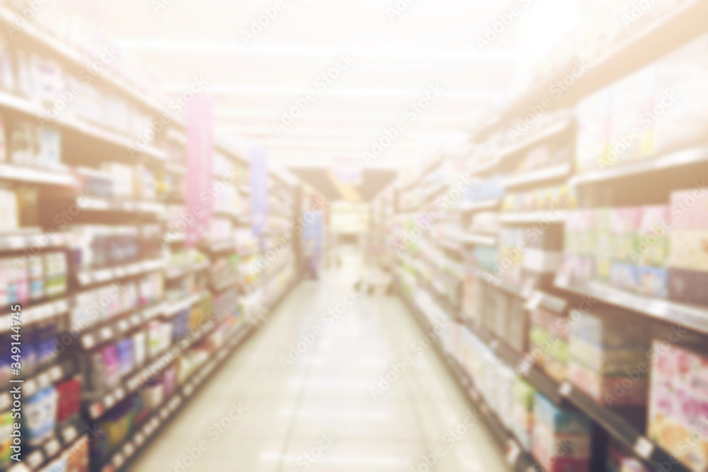  Mini mart convenience stores are a new alternative for the urban people. consumer product and skin care cream cosmetics shelf at supermarket on blur background.