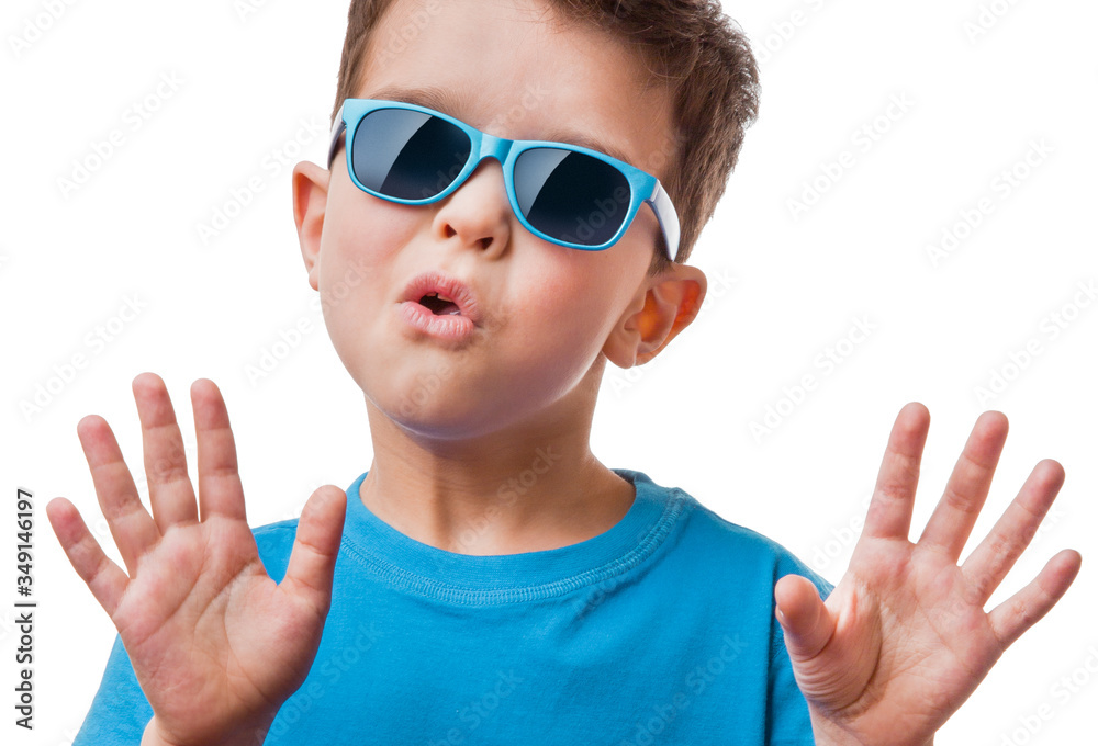 Little boy in sunglasses raised his hands up, isolated on white background Little boy in sunglasses raised his hands up, isolated on white background