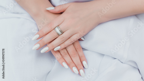 White classical pearl manicure, close up, beauty details