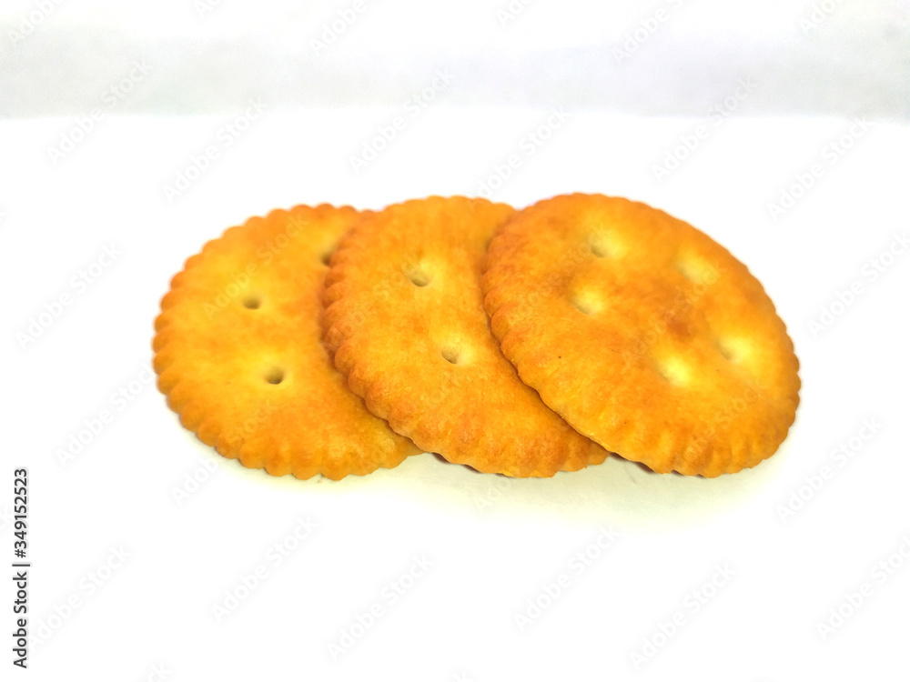 Stack of sweet meal digestive biscuits isolated on white