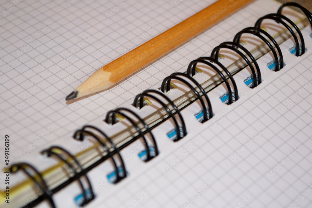 open notebook for writing or drawing with a pencil. open notebook for writing or drawing with a pencil.