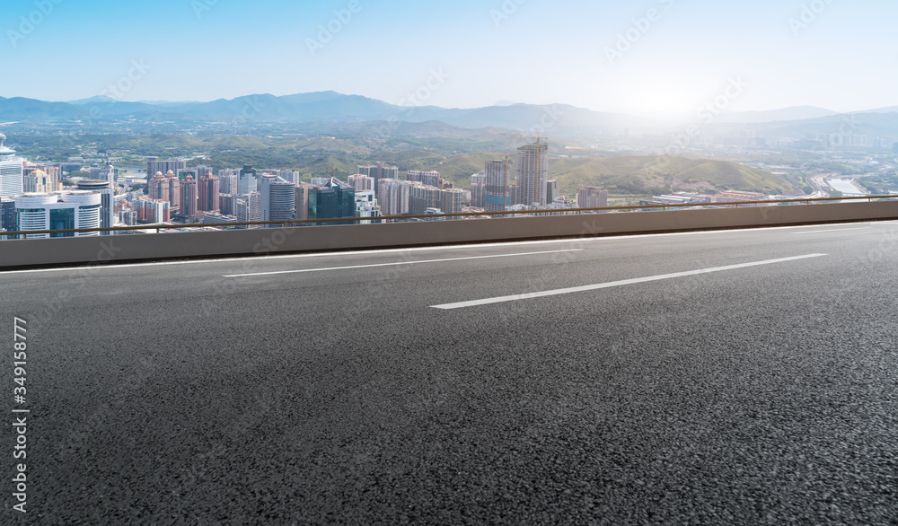 Fototapeta premium Urban road ground and architectural landscape