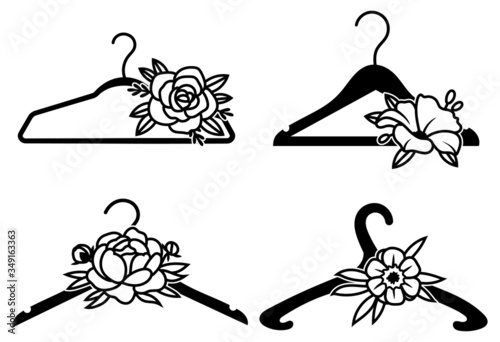 Set of hangers with flowers. Сollection of silhouettes of stylized floral hangers for clothes. Fashion hangers clothes. Vector illustration on a white background.