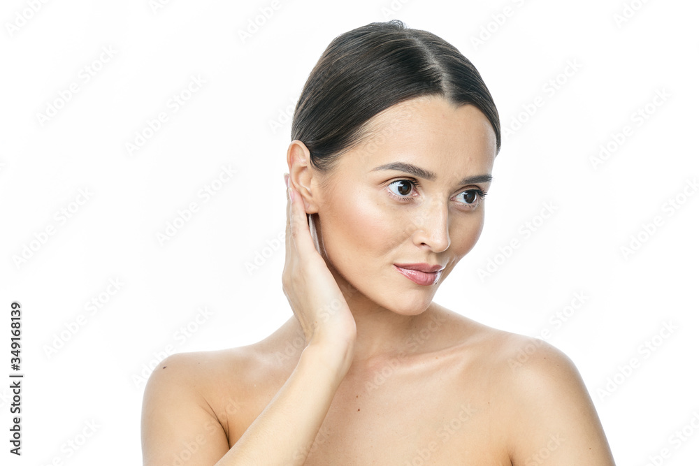 Beautiful smiling woman with clean skin, natural make-up, and white teeth on white background Beautiful smiling woman with clean skin, natural make-up, and white teeth on white background