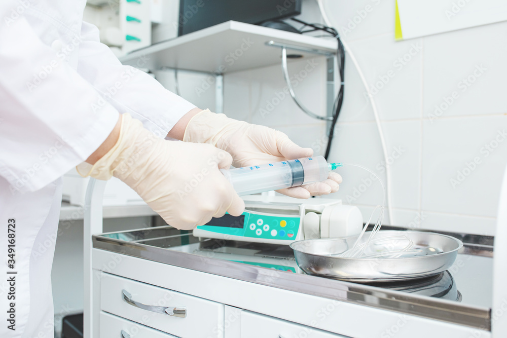 Electronic drug perfusion system (syringe pump) in the modern equipped critical care unit. Electronic drug perfusion system (syringe pump) in the modern equipped critical care unit.