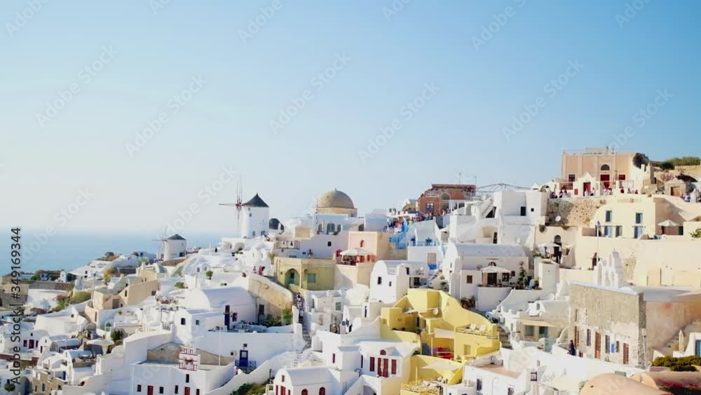The town fo Oia in Santorini, Greece at sundown The town fo Oia in Santorini, Greece at sundown