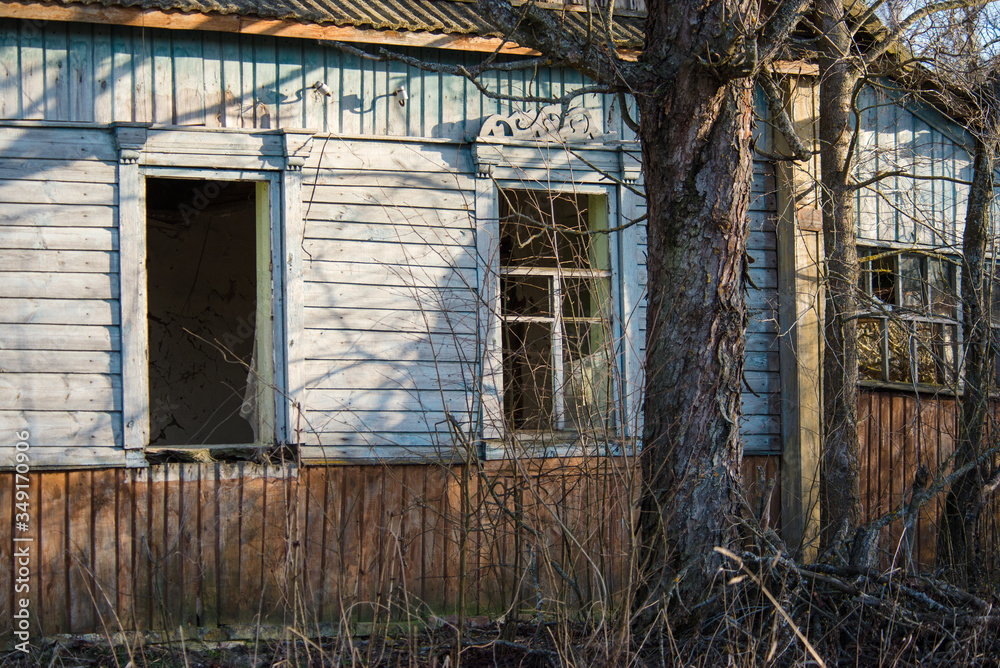 abandoned wooden house in a dead village in the Chernobyl exclusion zone abandoned wooden house in a dead village in the Chernobyl exclusion zone