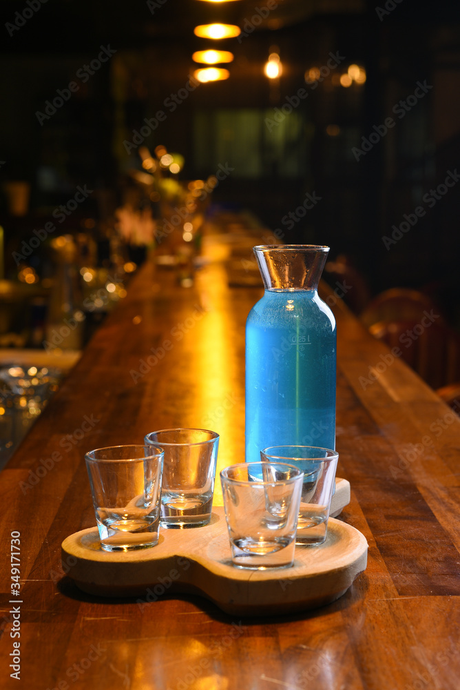 blue colored cocktail bar and restaurant in glass