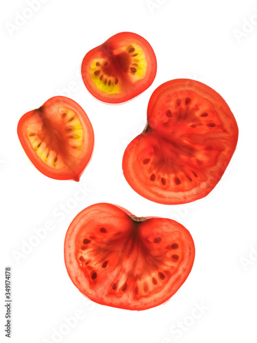 Fototapeta Naklejka Na Ścianę i Meble -  tomato, slices of tomato on a white background