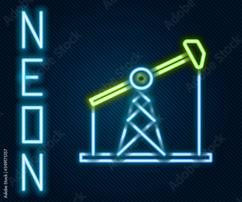 Glowing neon line Oil pump or pump jack icon isolated on black background. Oil rig. Colorful outline concept. Vector