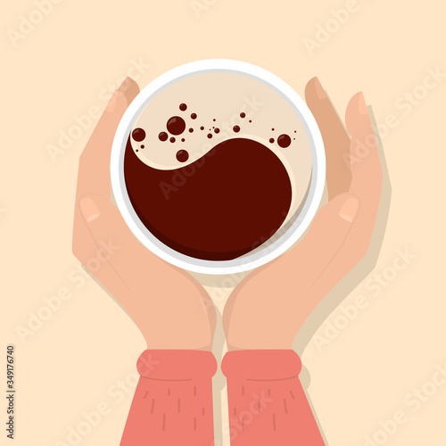 Hands holding cup of coffee top view