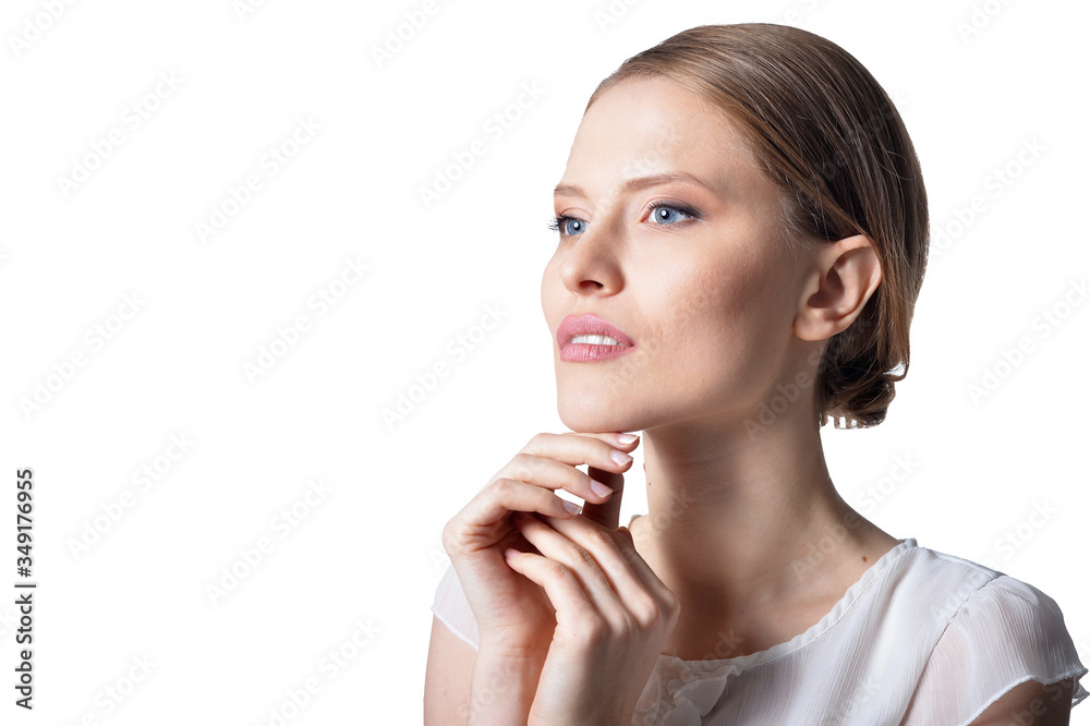 Portrait of beautiful young woman posing isolated on white background Portrait of beautiful young woman posing isolated on white background