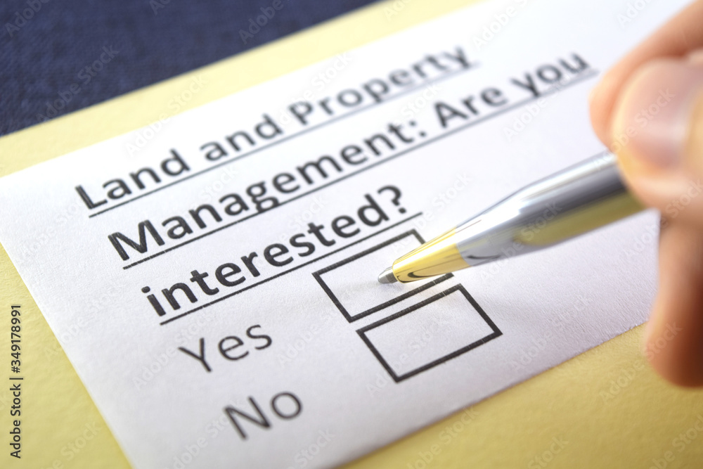 One person is answering question about land and property management. One person is answering question about land and property management.