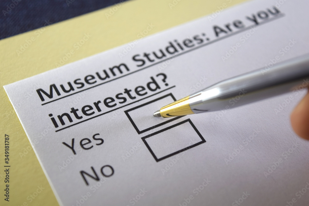 One person is answering question about museium studies. One person is answering question about museium studies.