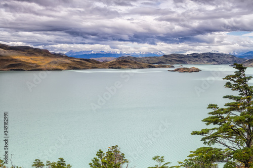 Epic beauty of the landscape - the National Park Torres del Paine in southern Chile. Lago Nordernskjold and mountains in the background photo