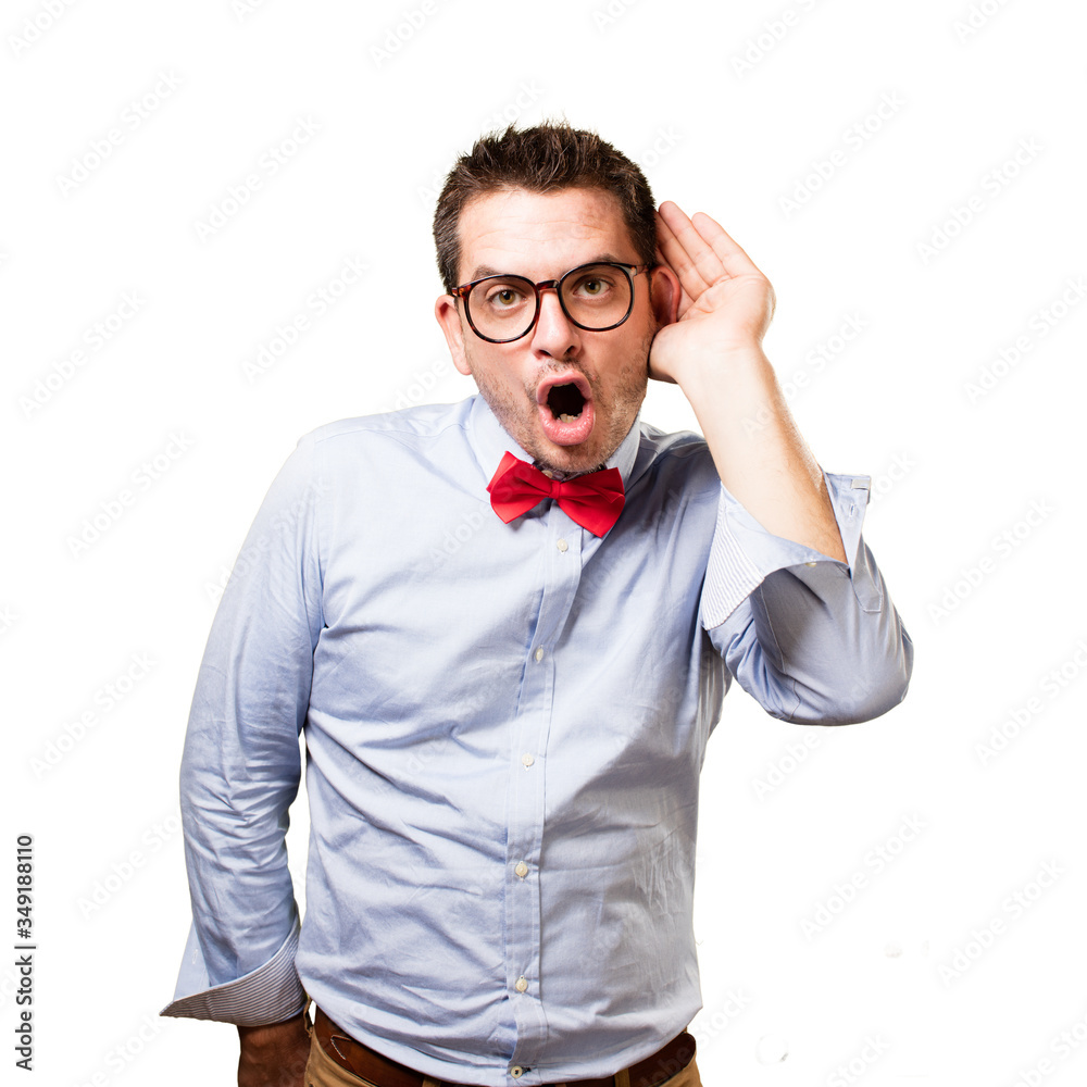 Man wearing a red bow tie. Paying attention to a noise. Man wearing a red bow tie. Paying attention to a noise.
