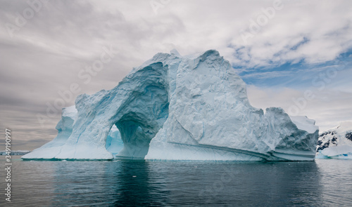 Arched and weathered iceberg, Antarctic Peninsula