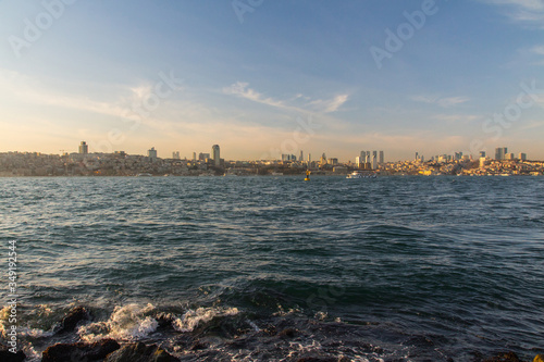 View of the Taksim district of Istanbul from the Bosphorus at sunset. Turkey