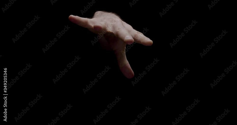 Wired Microphone Drop in slow motion. Black background