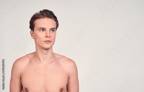 Beauty portrait of a shirtless young guy.