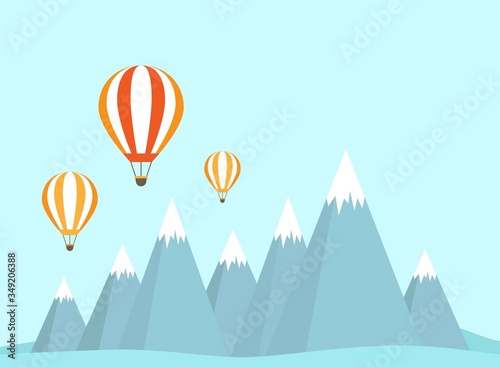 Two orange hot air balloon flying and landscape with mountains and clouds.