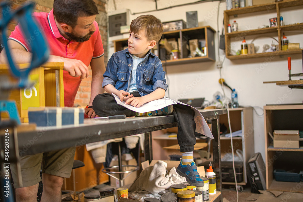 Father and Son Making a Birdhouse	
