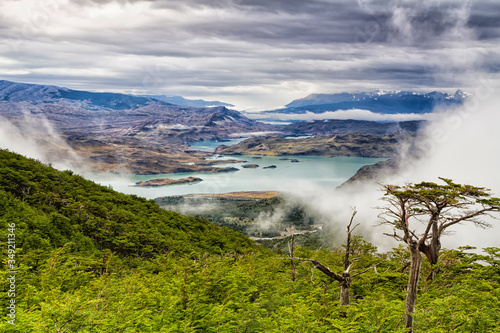 Epic beauty of the landscape - the National Park Torres del Paine in southern Chile. Lago Nordernskjold and mountains in the background photo